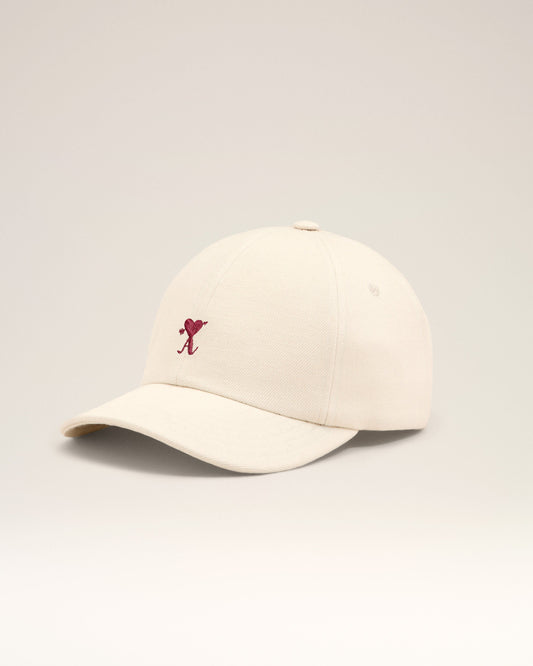 White cotton cap with Ami de Coeur arrow