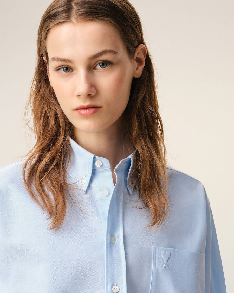 Blue cropped cotton shirt with embossed Ami de Coeur