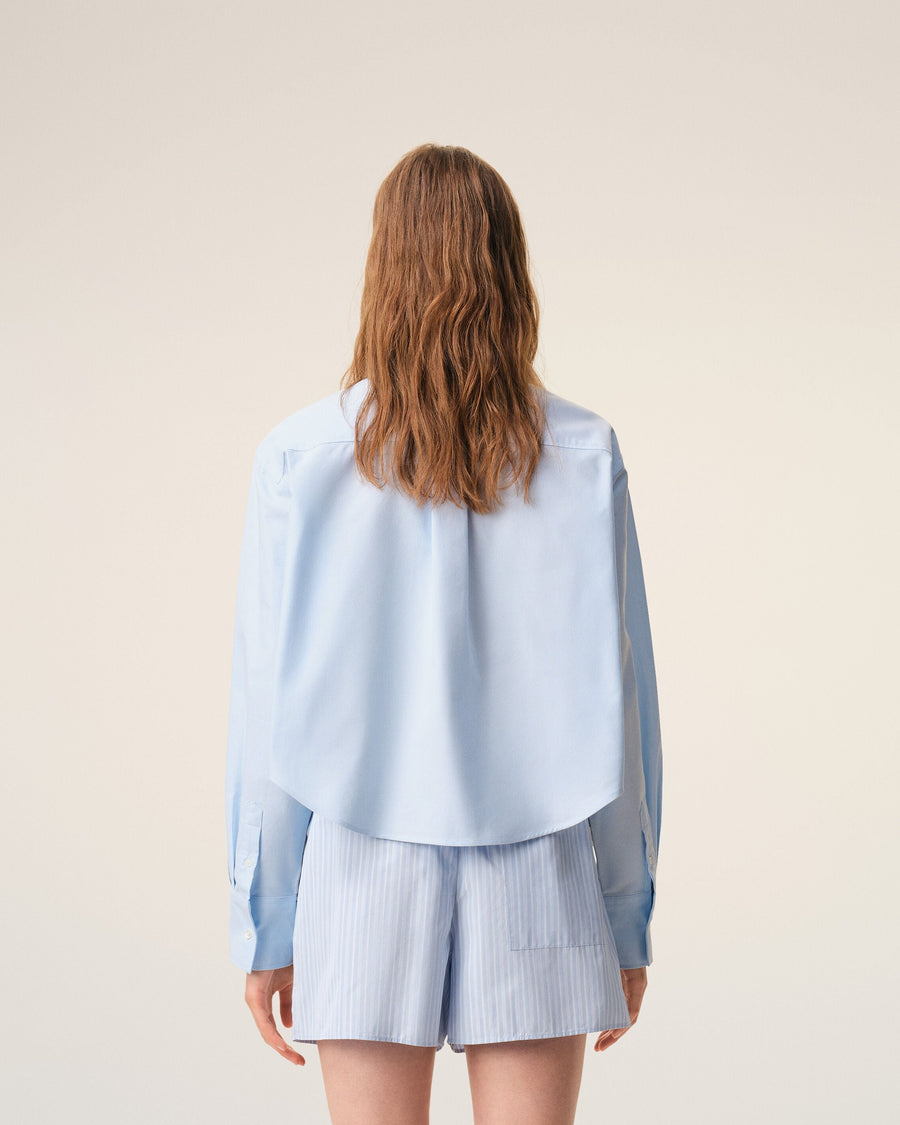 Blue cropped cotton shirt with embossed Ami de Coeur