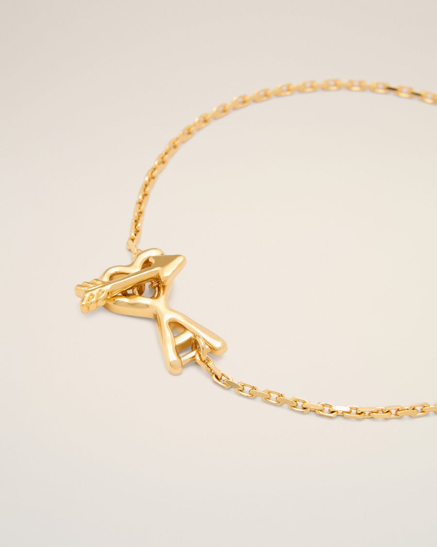 Gold brass bracelet with hammered Ami de Coeur arrow